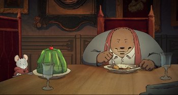 Movie still from “Ernest and Celestine: A Trip to Gibberitia” (2022), directed by Jean-Christophe Roger – A bear sitting at a table eating a plate of food; Medium shot, High angle