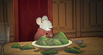 Movie still from “Ernest and Celestine: A Trip to Gibberitia” (2022), directed by Jean-Christophe Roger – A mouse sitting in front of a plate of food; Close Up shot, High angle