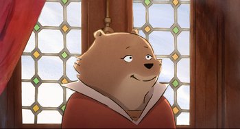 Movie still from “Ernest and Celestine: A Trip to Gibberitia” (2022), directed by Jean-Christophe Roger – A cartoon of a brown bear wearing a red shirt; Close Up shot, High angle