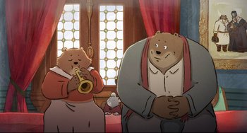 Movie still from “Ernest and Celestine: A Trip to Gibberitia” (2022), directed by Jean-Christophe Roger – Two cartoon bears are playing a musical instrument together; Wide shot, High angle