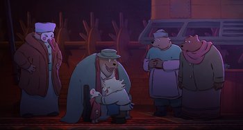 Movie still from “Ernest and Celestine: A Trip to Gibberitia” (2022), directed by Jean-Christophe Roger – A group of people standing around a room; Wide shot, Over the shoulder angle