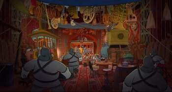 Movie still from “Ernest and Celestine: A Trip to Gibberitia” (2022), directed by Jean-Christophe Roger – A group of people are gathered in a living room; Extreme Wide shot, High angle