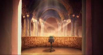 Movie still from “Ernest and Celestine: A Trip to Gibberitia” (2022), directed by Jean-Christophe Roger – An empty stage with a chair in the middle of it; Extreme Wide shot, High angle