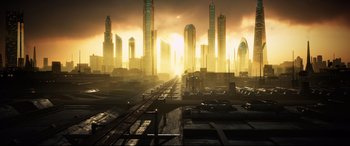 Movie still from “Escape Plan 2: Hades” (2018), directed by Steven C. Miller – An image of an urban scene with a train track in the foreground; Extreme Wide shot, High angle