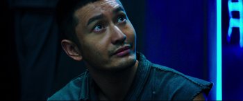 Movie still from “Escape Plan 2: Hades” (2018), directed by Steven C. Miller – A person looking up at the sky; Close Up shot, Low angle