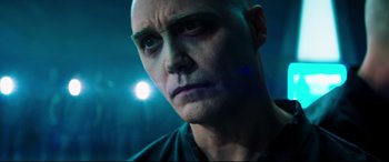 Movie still from “Escape Plan 2: Hades” (2018), directed by Steven C. Miller – A man with a bald head is looking at the camera; Close Up shot, Low angle