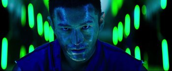 Movie still from “Escape Plan 2: Hades” (2018), directed by Steven C. Miller – A man with blue makeup on his face; Close Up shot, Low angle