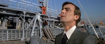 Movie still from “Escape from the Planet of the Apes” (1971), directed by Don Taylor – A person wearing a suit and tie; Close Up shot, Low angle
