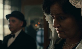 Movie still from “Europa Europa” (1990), directed by Agnieszka Holland – A person wearing a wedding veil; Close Up shot, Over the shoulder angle