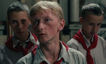 Movie still from “Europa Europa” (1990), directed by Agnieszka Holland – A group of young men standing next to each other; Close Up shot, Low angle