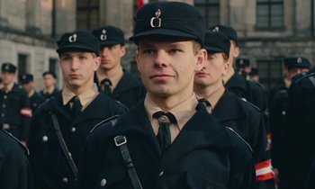 Movie still from “Europa Europa” (1990), directed by Agnieszka Holland – A group of young men in uniform standing next to each other; Close Up shot, Low angle