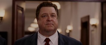 Movie still from “Evan Almighty” (2007), directed by Tom Shadyac – A person wearing a suit and tie; Close Up shot, Low angle