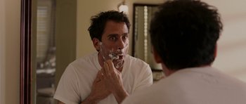 Movie still from “Evan Almighty” (2007), directed by Tom Shadyac – A man shaving his face in the mirror; Close Up shot, Over the shoulder angle