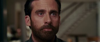 Movie still from “Evan Almighty” (2007), directed by Tom Shadyac – A person with a beard looking at the camera; Close Up shot, Over the shoulder angle