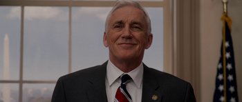 Movie still from “Evan Almighty” (2007), directed by Tom Shadyac – A person wearing a suit and tie; Close Up shot, Low angle