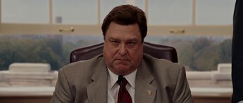 Movie still from “Evan Almighty” (2007), directed by Tom Shadyac – A person wearing a suit and tie; Close Up shot, Low angle