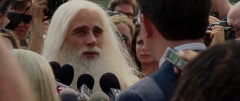 Movie still from “Evan Almighty” (2007), directed by Tom Shadyac – A man with a long white beard talking to a crowd; Close Up shot, Over the shoulder angle