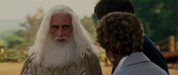 Movie still from “Evan Almighty” (2007), directed by Tom Shadyac – An old man with long white hair and a white beard; Close Up shot, Over the shoulder angle