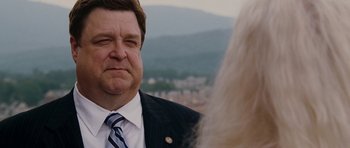 Movie still from “Evan Almighty” (2007), directed by Tom Shadyac – A person wearing a suit and tie; Close Up shot, Over the shoulder angle