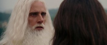 Movie still from “Evan Almighty” (2007), directed by Tom Shadyac – An old man with long white beard looking at a young woman; Close Up shot, Over the shoulder angle