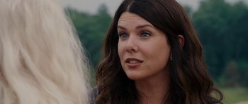 Movie still from “Evan Almighty” (2007), directed by Tom Shadyac – A person with long brown hair; Close Up shot, Over the shoulder angle