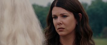 Movie still from “Evan Almighty” (2007), directed by Tom Shadyac – A person with long brown hair; Close Up shot, Over the shoulder angle