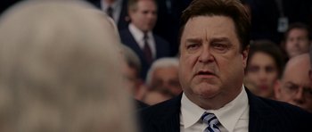 Movie still from “Evan Almighty” (2007), directed by Tom Shadyac – A man in a suit and a tie; Close Up shot, Over the shoulder angle