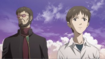 Movie still from “Evangelion: 2.0 You Can (Not) Advance” (2009), directed by Joe Fria – Two men standing next to each other in front of a cloudy sky; Close Up shot, Low angle