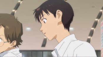Movie still from “Evangelion: 2.0 You Can (Not) Advance” (2009), directed by Joe Fria – A young man with short black hair looking to his left; Close Up shot, Low angle