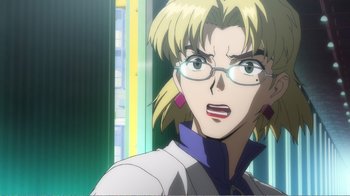 Movie still from “Evangelion: 2.0 You Can (Not) Advance” (2009), directed by Joe Fria – A woman with glasses is looking at the camera; Close Up shot, Low angle