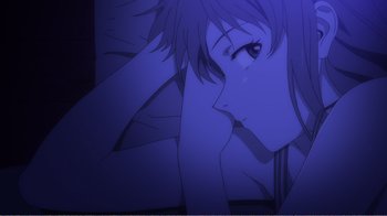 Movie still from “Evangelion: 2.0 You Can (Not) Advance” (2009), directed by Joe Fria – A woman with long black hair is looking into the distance; Extreme Close Up shot, High angle