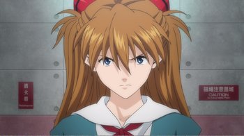 Movie still from “Evangelion: 2.0 You Can (Not) Advance” (2009), directed by Joe Fria – A person with long brown hair; Close Up shot, Low angle