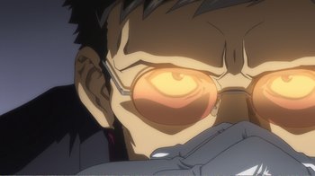 Movie still from “Evangelion: 2.0 You Can (Not) Advance” (2009), directed by Joe Fria – An animated picture of a person with glasses; Extreme Close Up shot, Low angle