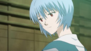 Movie still from “Evangelion: 2.0 You Can (Not) Advance” (2009), directed by Joe Fria – A person with short hair; Extreme Close Up shot, Low angle