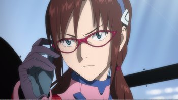 Movie still from “Evangelion: 2.0 You Can (Not) Advance” (2009), directed by Joe Fria – A person holding a cell phone; Close Up shot, Low angle