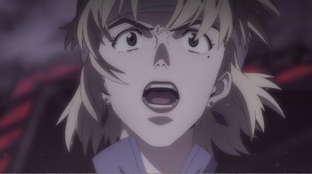 Movie still from “Evangelion: 2.0 You Can (Not) Advance” (2009), directed by Joe Fria – An animated face of a woman with long blonde hair; Extreme Close Up shot, Low angle