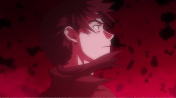 Movie still from “Evangelion: 2.0 You Can (Not) Advance” (2009), directed by Joe Fria – A man in a red shirt is looking at the camera; Extreme Close Up shot, Low angle