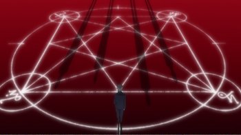 Movie still from “Evangelion: 2.0 You Can (Not) Advance” (2009), directed by Joe Fria – A man standing in front of a red background; Extreme Wide shot, Overhead angle