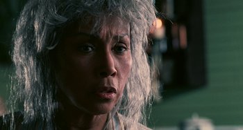 Movie still from “Eve's Bayou” (1997), directed by Kasi Lemmons – A person wearing a wig; Close Up shot, Low angle