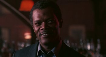 Movie still from “Eve's Bayou” (1997), directed by Kasi Lemmons – A person wearing a suit and tie; Close Up shot, Low angle