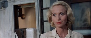 Movie still from “Exodus” (1960), directed by Otto Preminger – A woman with blonde hair is looking to her left; Close Up shot, Low angle