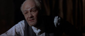 Movie still from “Exodus” (1960), directed by Otto Preminger – An old man with a beard and a white mustache; Close Up shot, Low angle