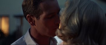 Movie still from “Exodus” (1960), directed by Otto Preminger – A man and a woman kissing; Close Up shot, Over the shoulder angle