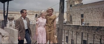 Movie still from “Exodus” (1960), directed by Otto Preminger – A woman and a young girl standing next to each other on a bridge; Wide shot, Low angle