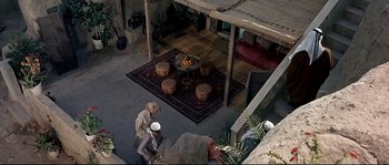 Movie still from “Exodus” (1960), directed by Otto Preminger – An overhead view of an outdoor living area; Extreme Wide shot, Overhead angle
