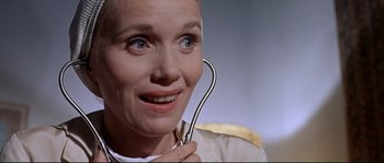 Movie still from “Exodus” (1960), directed by Otto Preminger – A person holding a fork in her hand; Close Up shot, Low angle