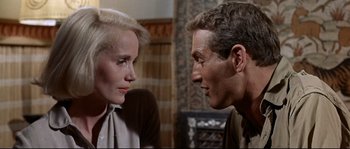 Movie still from “Exodus” (1960), directed by Otto Preminger – A man and a woman talking to each other; Close Up shot, Over the shoulder angle