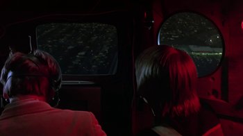 Movie still from “Explorers” (1985), directed by Joe Dante – Two people sitting in the back of a car; Medium shot, Over the shoulder angle