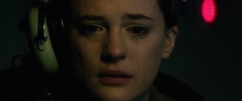 Movie still from “Eye in the Sky” (2015), directed by Gavin Hood – A person with tears in their eyes; Close Up shot, High angle