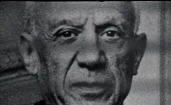 Movie still from “F for Fake” (1973), directed by François Reichenbach – An old black and white photo of a man's face; Extreme Close Up shot, Low angle